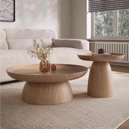Kotto solid wood round coffee table with tray top pedestal base Japandi Scandinavian design for lounge space and calm interiors