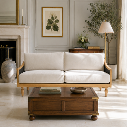 Fermo rustic modern sofa – side view showing cane back panel and exposed wooden legs