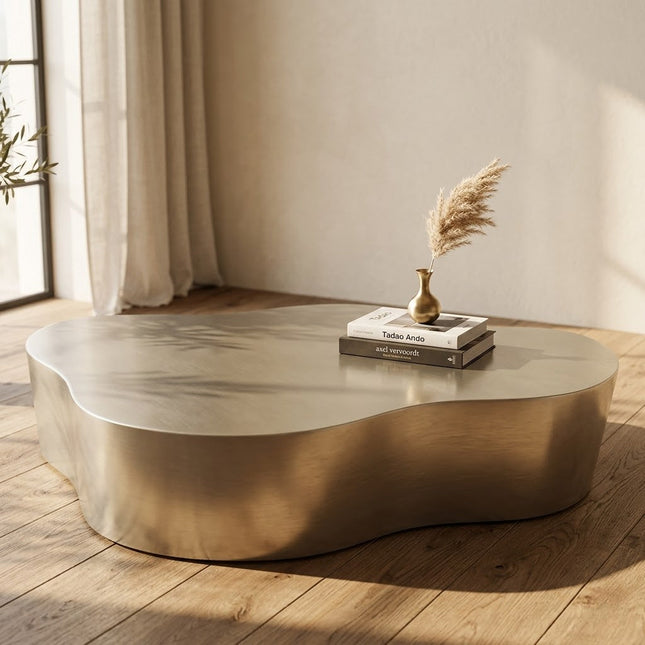 Selenga sculptural coffee table for modern lounge spaces inspired by contemporary European design with premium metal form and refined polish