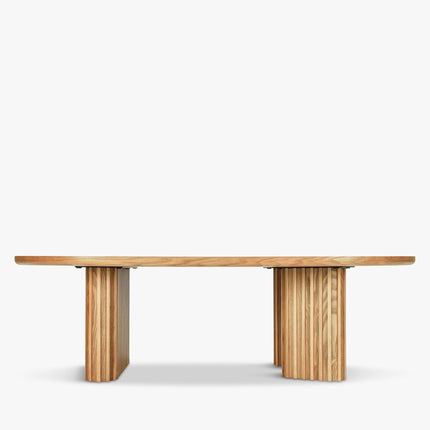 Sittang sculptural solid wood coffee table inspired by contemporary Scandinavian design for family room and lounge spaces
