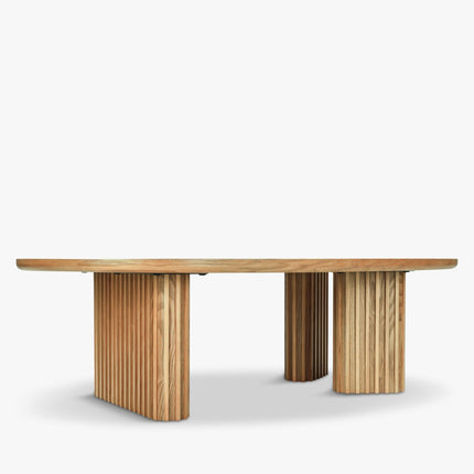 Sittang sculptural solid wood coffee table inspired by contemporary Scandinavian design for family room and lounge spaces