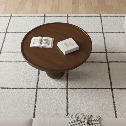 Bandama round solid wood coffee table with ball base mid century modern Japandi design for reading lounge and library seating space