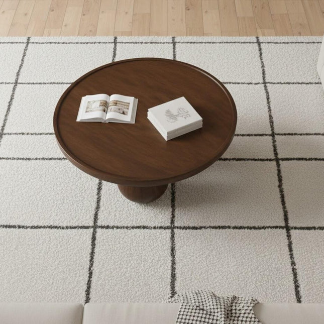 Bandama round solid wood coffee table with ball base mid century modern Japandi design for reading lounge and library seating space